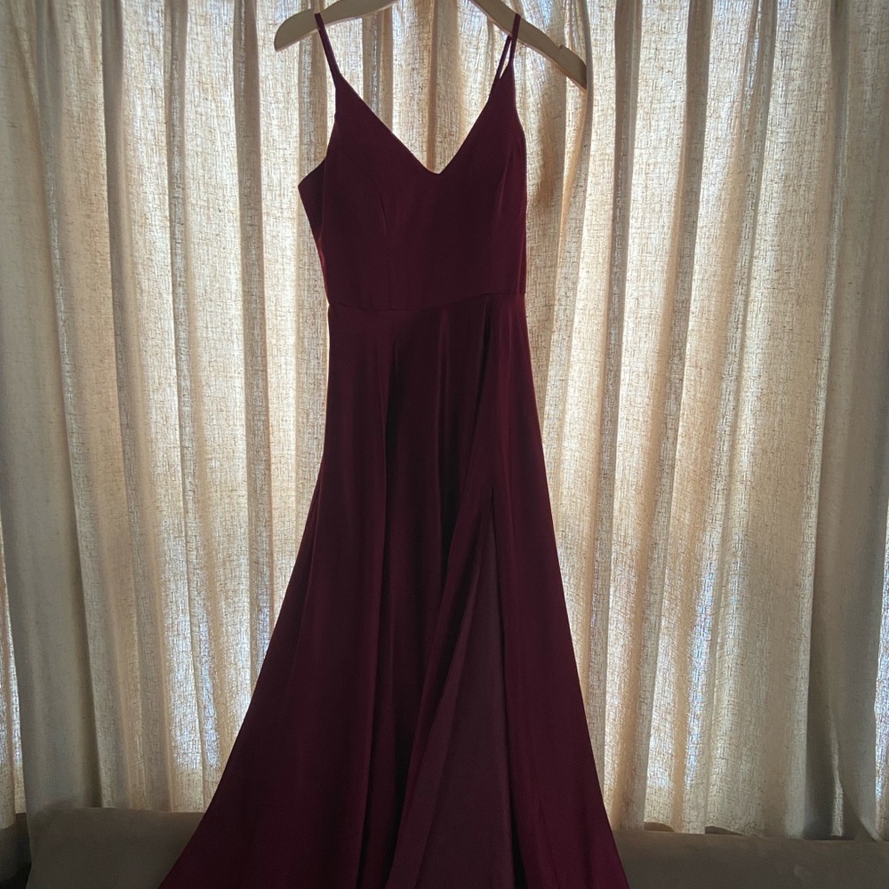Maroon homecoming dress. Wore once. Size 1/2 Beautiful dress with pockets